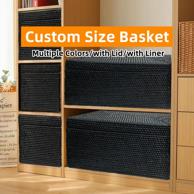 May include: Black woven storage baskets with lids, displayed on a wooden shelf. The baskets are available in multiple colors and come with a liner. The text "Custom Size Basket" and "Multiple Colors/with Lid/with Liner" is displayed above the baskets.