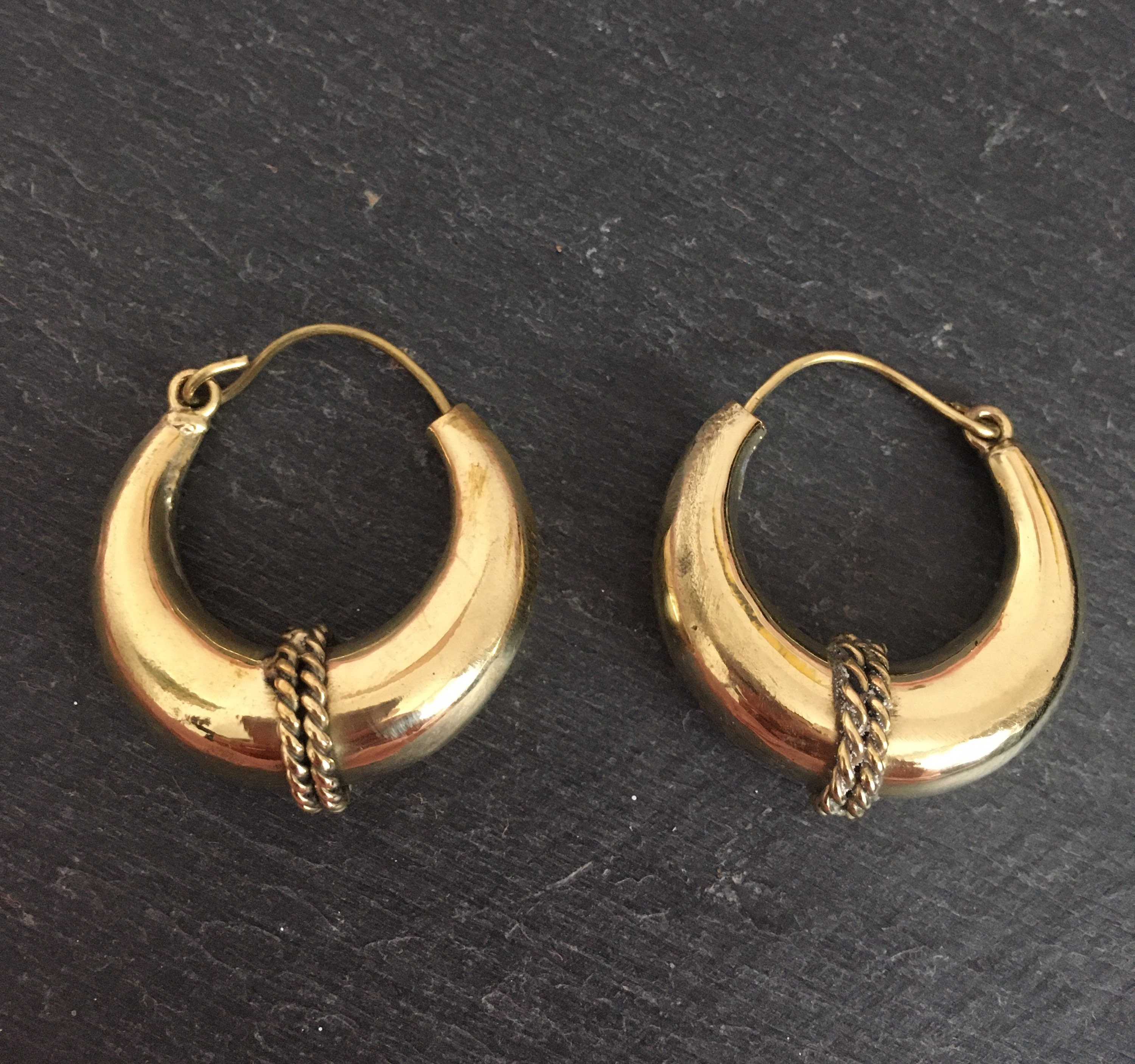 Brass hoop earrings with detailed band. | Etsy