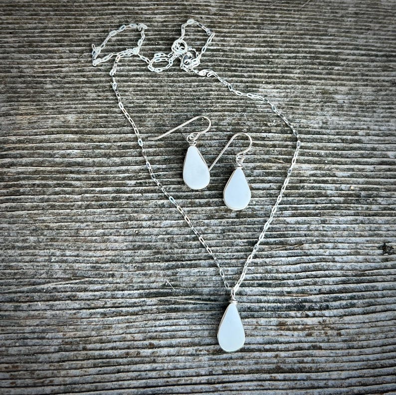 Healing Crystal Jewelry - This white jasper jewelry set is more than just an accessory—it's a healing stone set designed to bring balance and peace. White jasper is known for its calming and grounding energy, making this unique gift for her perfect for those who practice energy healing. Handcrafted on Martha’s Vineyard, this boho jewelry set blends natural elegance with spiritual significance. It is a beautiful energy healing gift for her.