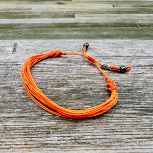 Orange awareness bracelet for Leukemia awareness, MS awareness and Kidney Cancer awareness. Orange awareness jewelry handmade by Rumi Sumaq.