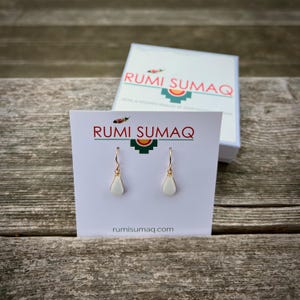 Unique Gift for Her White Jasper Earrings. Looking for a unique gift for her? This handmade white jasper jewelry set is perfect for birthdays, anniversaries or special occasions. Featuring a white jasper pendant necklace and teardrop earrings, this gemstone jewelry set is crafted with love by Quechua artisan Coco Paniora Salinas at his Marthas Vineyard studio Rumi Sumaq. White jasper is believed to promote balance and emotional clarity, making this a meaningful and stylish healing stone set.