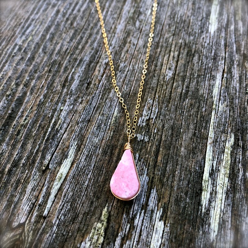 Simple pink necklace Rhodonite stone pendant for women in teardrop shape and minimalist 14k Gold fill chain handmade by Rumi Sumaq jewelry.