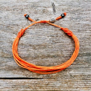 Orange awareness bracelet for leukemia awareness, multiple sclerosis awareness, prader willi syndrome awareness, lupus awareness and copd awareness. Orange awareness jewelry for men, women and kids handmade by Rumi Sumaq.