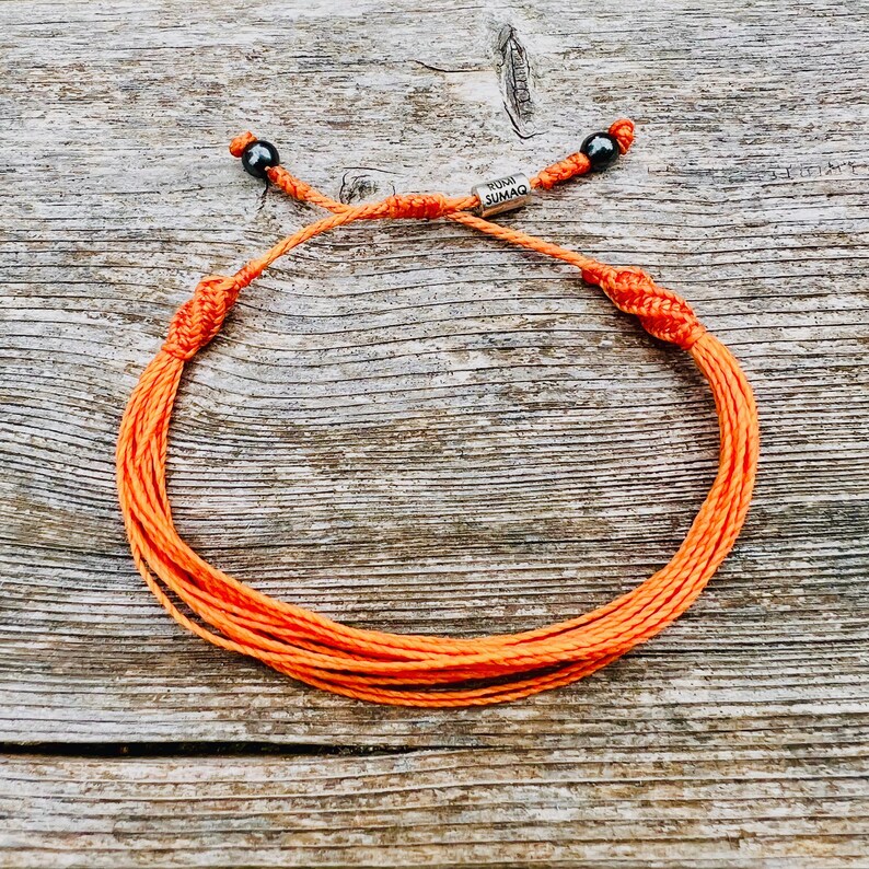 Orange awareness bracelet for leukemia awareness, multiple sclerosis awareness, prader willi syndrome awareness, lupus awareness and copd awareness. Orange awareness jewelry for men, women and kids handmade by Rumi Sumaq.