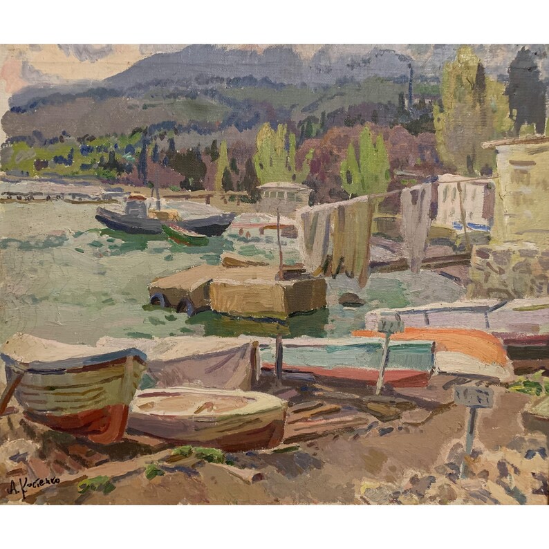 May include: A painting of a harbor scene with several boats docked along the shore. The boats are various colors, including white, brown, and green. The water is a light blue-green color, and the sky is a light blue color. There are trees and hills in the background.