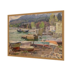 May include: A painting depicting a harbor scene with boats docked along the shore. The boats are various shades of blue, green, red, and yellow. The water is a light blue-green color. The background features a mountain range and trees.