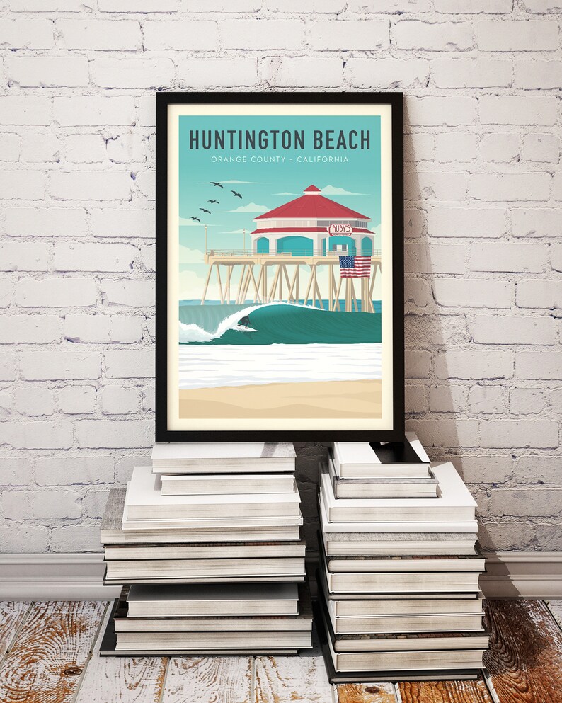 Huntington Beach Pier Surfing Print set down on books