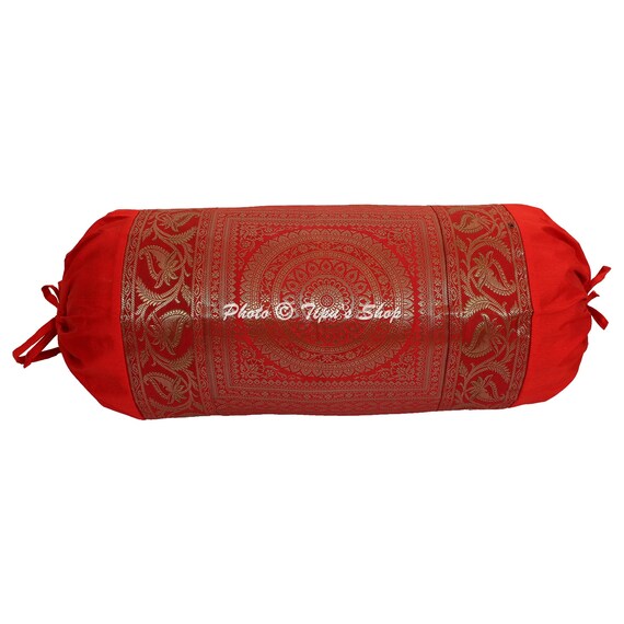 red bolster cushion