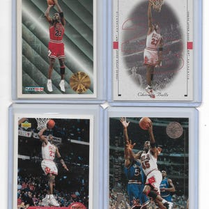 4-Card Michael Jordan Vintage Lot - 1994-95 He's Back 45 Jersey, 1998-99 SP Authentic, 1992-93 Upper Deck, 1993-94 Fleer League Leader
