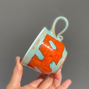 Handmade orange mug with green rain drops.Coffee mug with.Eco-Friendly ceramic mug.Wheel Thrown Pottery Mug .