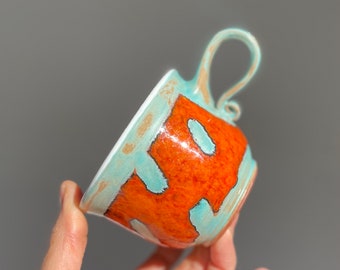 Handmade orange mug with green rain drops.Coffee mug with.Eco-Friendly ceramic mug.Wheel Thrown Pottery Mug .