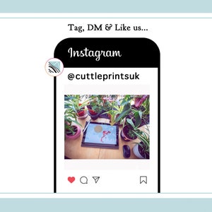 May include: A close-up of a tablet screen with a red and white design. The tablet is on a wooden table surrounded by potted plants. The Instagram logo and the text "@cuttleprintsuk" are visible on the screen.