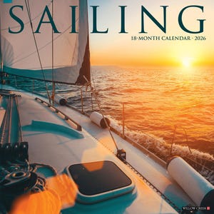 May include: A sailing-themed calendar for 2026. The cover features a sailboat on the water at sunset, with the word "SAILING" in large teal letters. The calendar is an 18-month calendar.