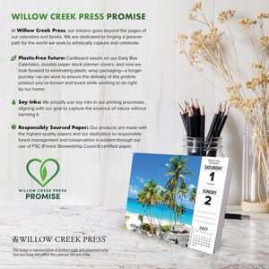 May include: A desktop calendar featuring a tropical beach scene with palm trees and turquoise water. The calendar displays the days Saturday 1 and Sunday 2 of July. The calendar is on a white surface with pencils and a vase of dried flowers.