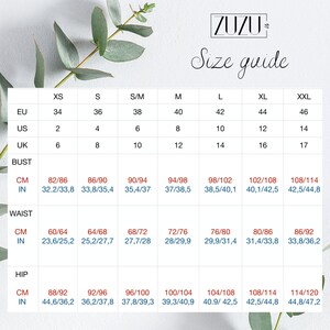 May include: Size chart for clothing in US, UK, and EU sizes. The chart shows measurements in inches and centimeters for bust, waist, and hip.