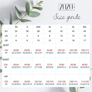 May include: Size chart for clothing in US, UK, and EU sizes. The chart shows measurements in inches and centimeters for bust, waist, and hip.