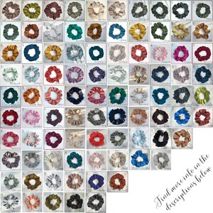 May include: A collection of 100 colorful scrunchies made from fabric. The scrunchies are arranged in a grid pattern, with each scrunchie in its own square. The scrunchies are all different colors, including red, blue, green, yellow, orange, purple, pink, and brown.