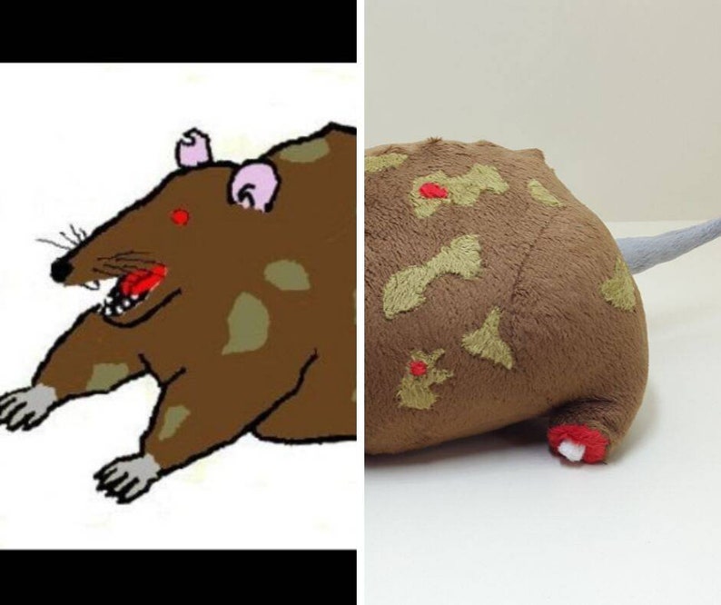 K&ouml;nnte beinhalten: Eine braune und beige Pl&uuml;schratte mit einem langen Schwanz. Die Ratte hat ein cartoonartiges Aussehen mit einem breiten Maul und gro&szlig;en Ohren. Die Ratte liegt auf der Seite mit den Beinen unter dem K&ouml;rper.