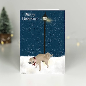 Biglietto di Natale con carlino che fa pipì