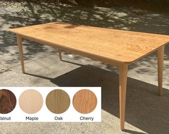 Mid Century Modern Dining Table shown in Cherry. Also available in Maple, Oak and Walnut.