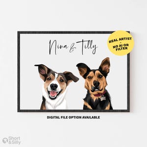 May include: A framed digital illustration of two dogs with the text Nina & Tilly. The left dog is brown, white, and black with an open mouth. The right dog is black and tan with a red collar and bone tag. A yellow circle reads REAL ARTIST - NO AI OR FILTER.