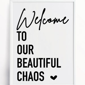 May include: Black and white printable wall art with the text "Welcome to our beautiful chaos" and a small heart.
