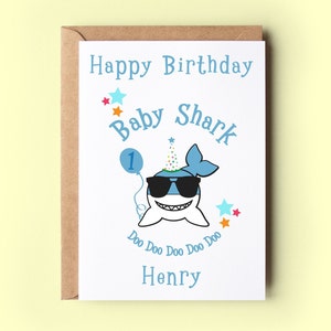 Happy Birthday Card to a baby shark doo doo doo doo doo. Personalised with their name and age