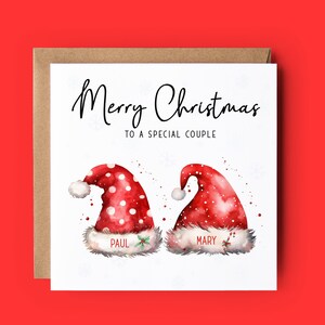 Merry Christmas to a special couple with Santa hats personalised with their names