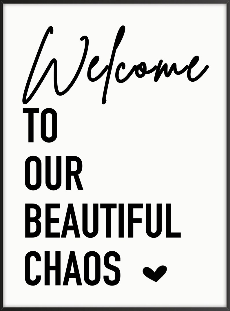 May include: Black and white typography print with the text "Welcome to our beautiful chaos" and a small heart symbol.