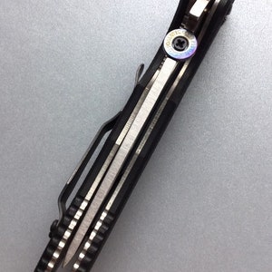 Fits Kershaw Emerson CQC Models • Flamed Titanium COLT Thumb Disc • Custom Made