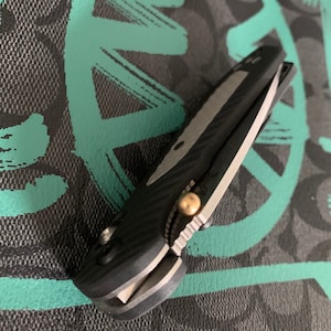 Fits Benchmade Knives Thumb Stud Benchmade Upgrade Stud Many Benchmade Models Listed • 1x BRASS BALL Thumb Stud Per Order Benchmade Knives