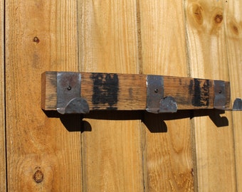 3 Post Whiskey Barrel Stave coat rack with band hangers 19in by 2 1/2". Great for Cowboy Hats, Caps, Towels, Blankets & Coats