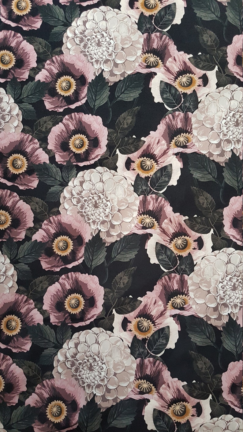 May include: A black fabric with a floral pattern featuring pink poppies and white dahlias. The flowers are arranged in a repeating pattern and have a vintage aesthetic.