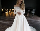 A line wedding dress Olivia by Olivia Bottega. Wedding dress off the shoulder
