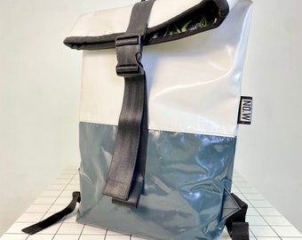 Handmade Upcycled Backpack, Waterproof, Durable, Unique Design with Inner Pocket and Key Strap.