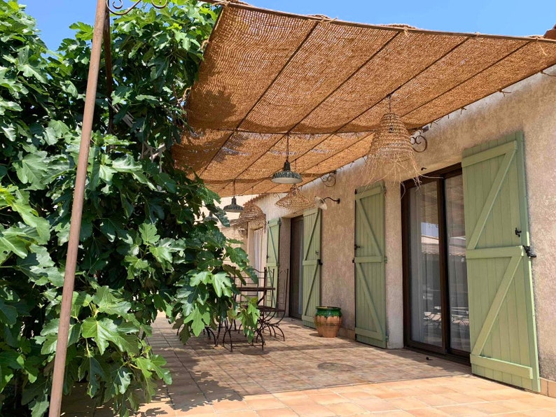 Shade sails made from 100% natural and ecological coconut fibers. To be placed on a structure wooden frame pergola image 3