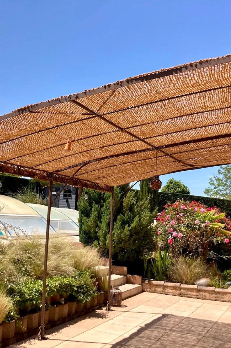 Shade sails made from 100% natural and ecological coconut fibers. To be placed on a structure wooden frame pergola image 1