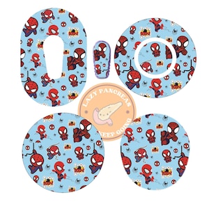 May include: Set of five colourful round stickers featuring a cartoon Spiderman design on a light blue background. The stickers are for a medical device.