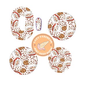 May include: A set of adhesive patches for medical devices featuring a repeating pattern of Santa Claus faces, chocolate chip cookies, and candy canes on a light background. A circular sticker with a cartoon pancreas and the text LAZY PANCREAS JUST KEEP GOING is included.