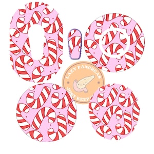 May include: A set of adhesive patches for medical devices featuring a pink background with a red and white candy cane pattern. The set includes one oval patch, one small rectangular patch, two circular patches, and a circular sticker with a pancreas illustration and the text Lazy Pancreas Just Keep Swimming.