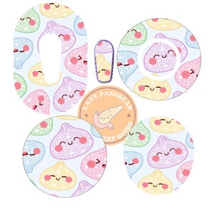 May include: A set of adhesive patches for medical devices featuring a repeating pattern of glittery, smiling dumpling characters in pastel pink, yellow, green, and blue. A circular sticker in the centre displays a pancreas illustration and the text LAZY PANCREAS KEEP GOING.