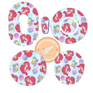 May include: A set of adhesive patches for medical devices featuring a repeating pattern of a red-haired mermaid, a yellow fish, and purple seashells on a light blue background. A circular logo with the text LAZY PANCREAS KEEP GOING is included.