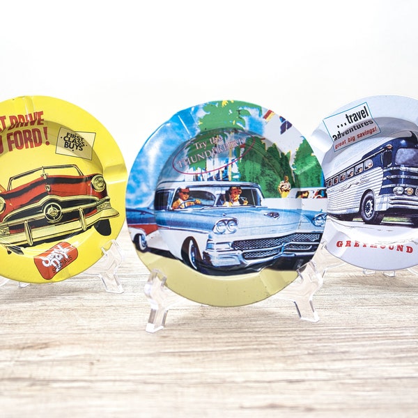 Set of 3 tin ashtrays, probably 1970s, 50s US advertising (Ford, Genral Motors, Greyhound Bus) - 9C3