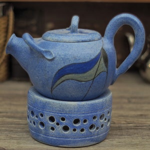 Handmade Danish teapot with warmer for tea lights to keep them warm, both in maritime blue tones. Small chip on the neck