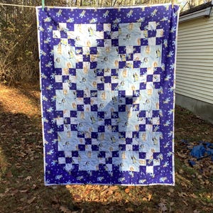Hand quilted Bluey crib quilt