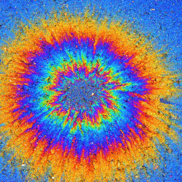 a downloadable digital image of a bulls eye shaped round colorful oil slick