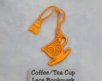 May include: Orange lace coffee or tea cup bookmark with a tassel. The bookmark is labeled "Coffee/Tea Cup Lace Bookmark 1137 Citrus Burst".