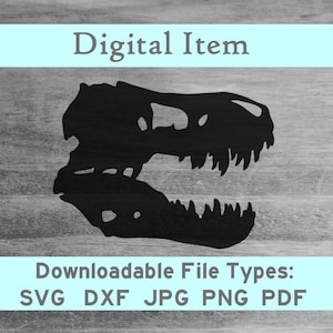May include: Black silhouette of a dinosaur skull, a digital download available in SVG, DXF, JPG, PNG, and PDF file formats.
