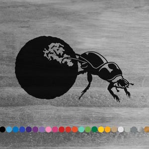 May include: A black silhouette of a beetle pushing a large ball. The beetle is detailed with legs, antennae, and a segmented body. The background is a gray, wood-grain texture. A row of color swatches is at the bottom.