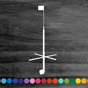 May include: A white silhouette of a golf flagstick featuring a tall pole, a small rectangular flag at the top, a cross-shaped base for stability, and a golf ball at the bottom. Below the graphic are eighteen small colored circles in a row.